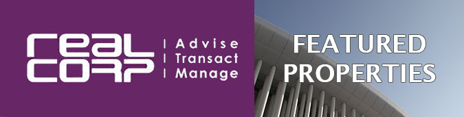Newsletter header image showing on the left in white on a purple background the RealCorp logo including the words Advise, Transact, Manage, and on the right an artistic photo of the white columns of the Luxembourg Philharmonic building against a blue sky, behind the words Featured Properties in white. This newsletter includes Properties in Gare and other Luxembourg localities.